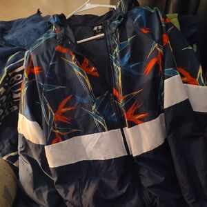 Colorful Zip With Pockets Windbreaker With Hood. Size XL (46 48).